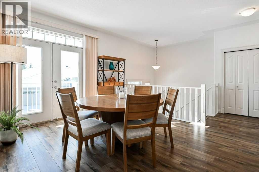 Single Family House Bi-level for Sale in  Discovery Woods Villas SW Discovery Ridge Calgary 