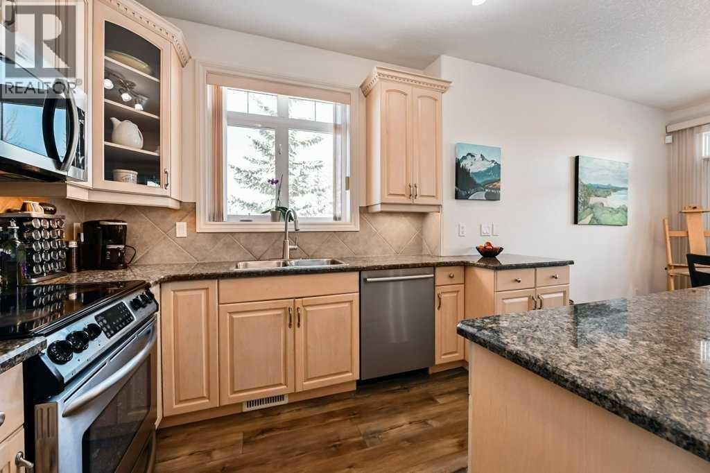 Single Family House Bi-level for Sale in  Discovery Woods Villas SW Discovery Ridge Calgary 