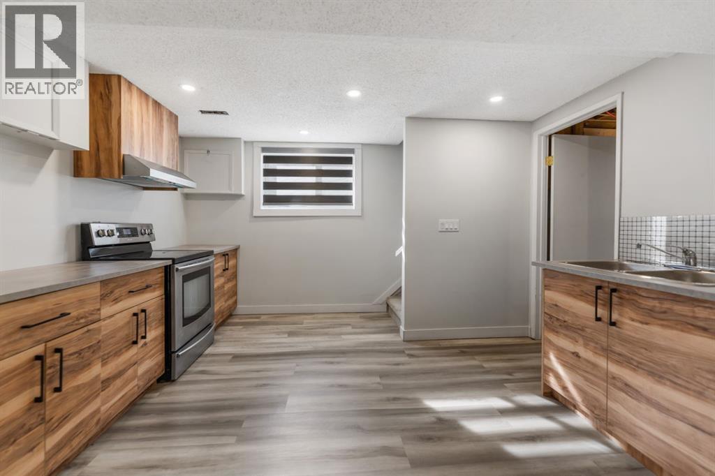 Single Family House Bungalow for Sale in  MANORA Crescent NE Marlborough Park Calgary 