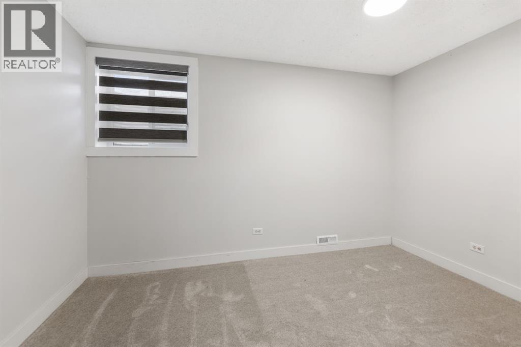 Single Family House Bungalow for Sale in  MANORA Crescent NE Marlborough Park Calgary 