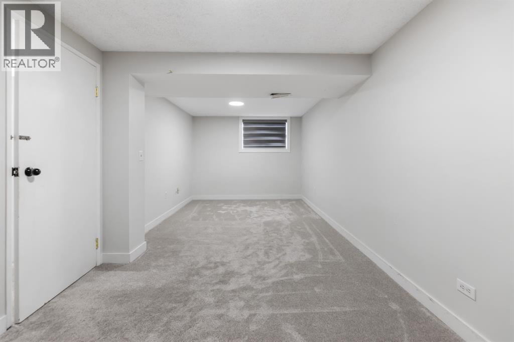 Single Family House Bungalow for Sale in  MANORA Crescent NE Marlborough Park Calgary 