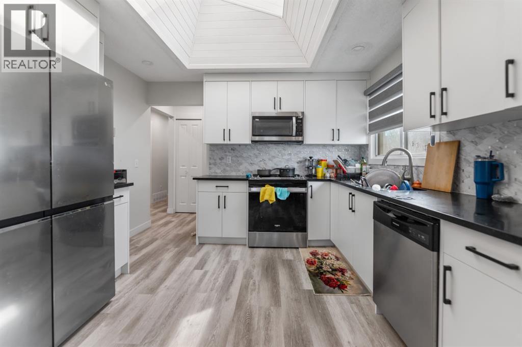 Single Family House Bungalow for Sale in  MANORA Crescent NE Marlborough Park Calgary 