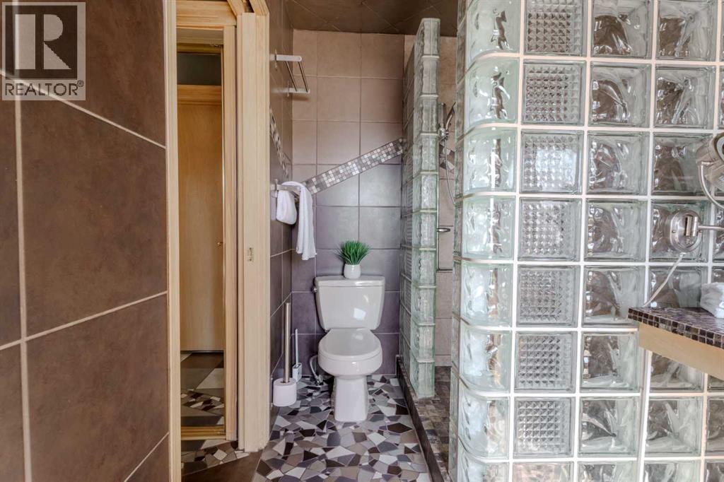 Single Family House for Sale in  Canterbury Court SW Canyon Meadows Calgary 