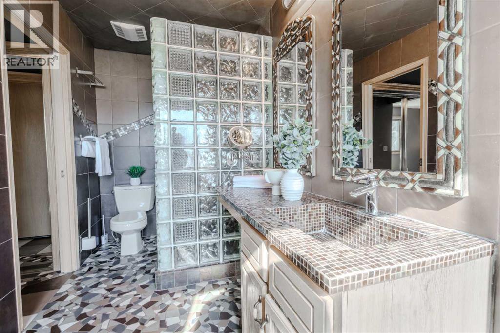 Single Family House for Sale in  Canterbury Court SW Canyon Meadows Calgary 