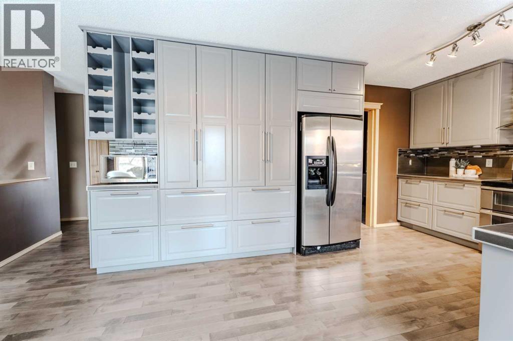 Single Family House for Sale in  Canterbury Court SW Canyon Meadows Calgary 