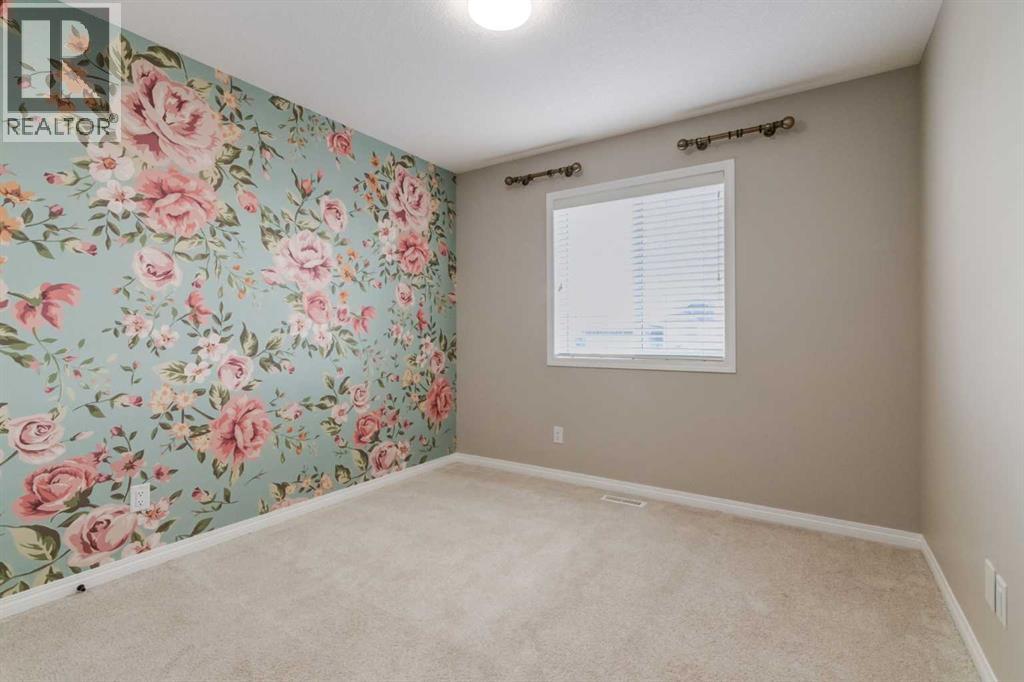 Single Family House for Sale in  Belmont Drive SW Belmont Calgary 