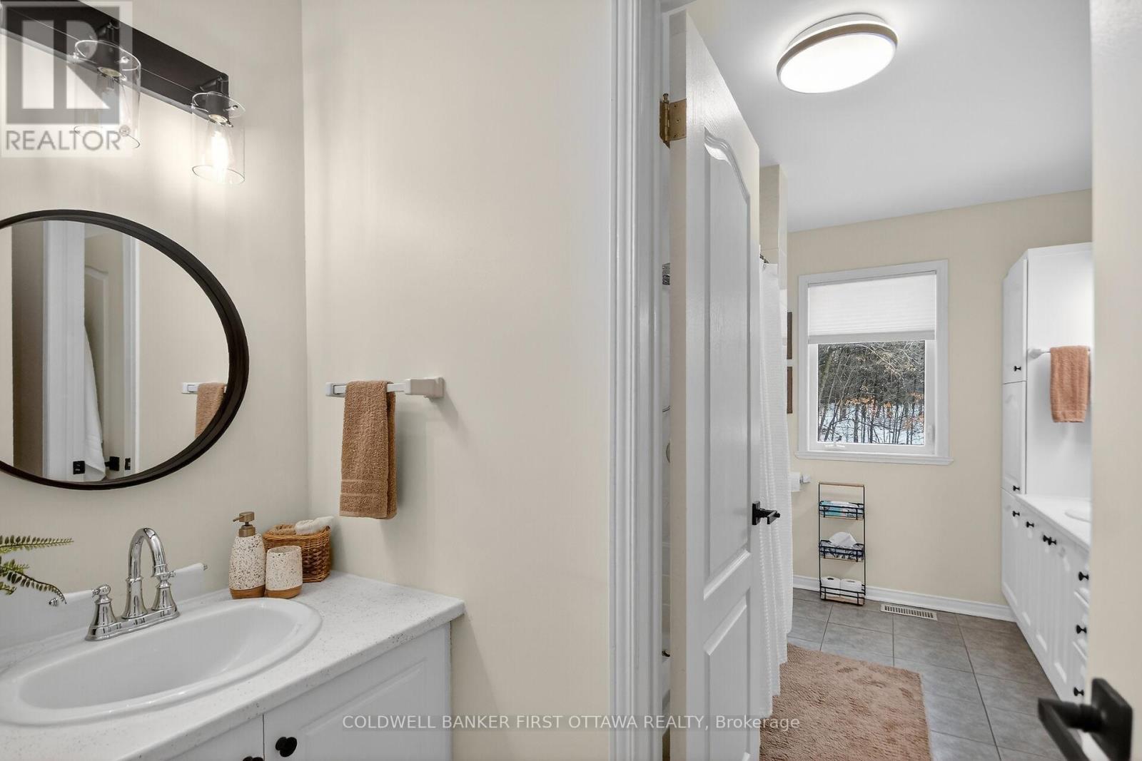 2 piece powder room adjoins ensuite full bath