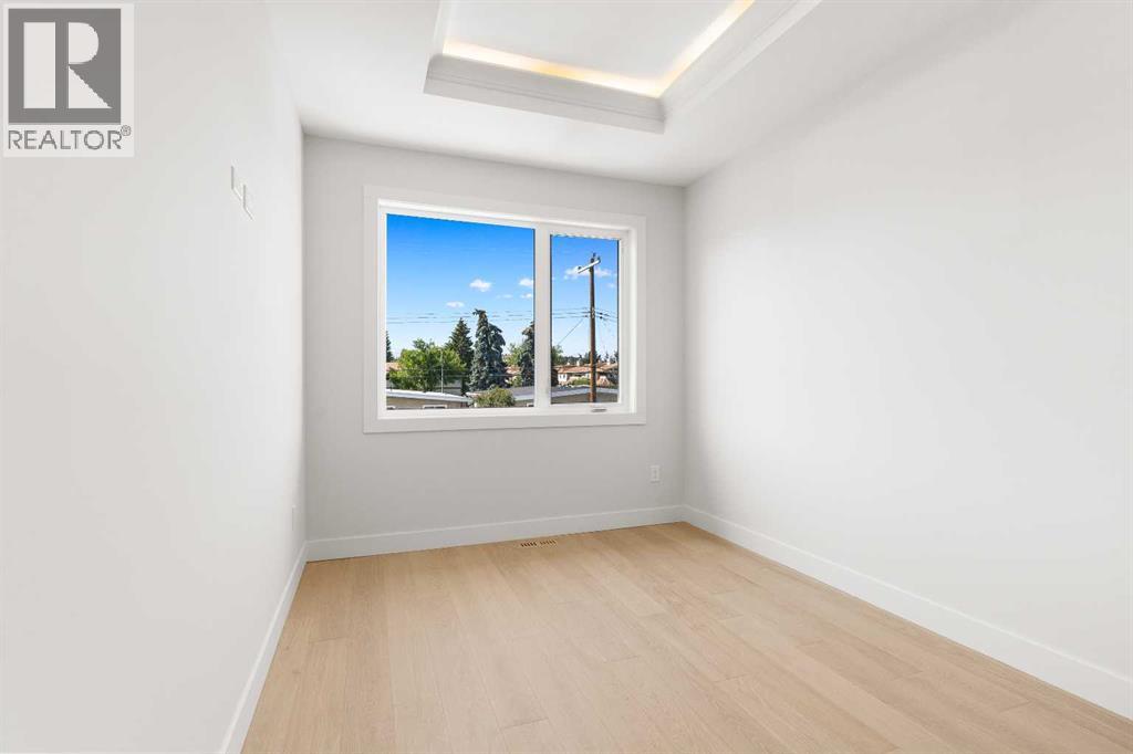 Single Family House for Sale in   Street SW Rosscarrock Calgary 