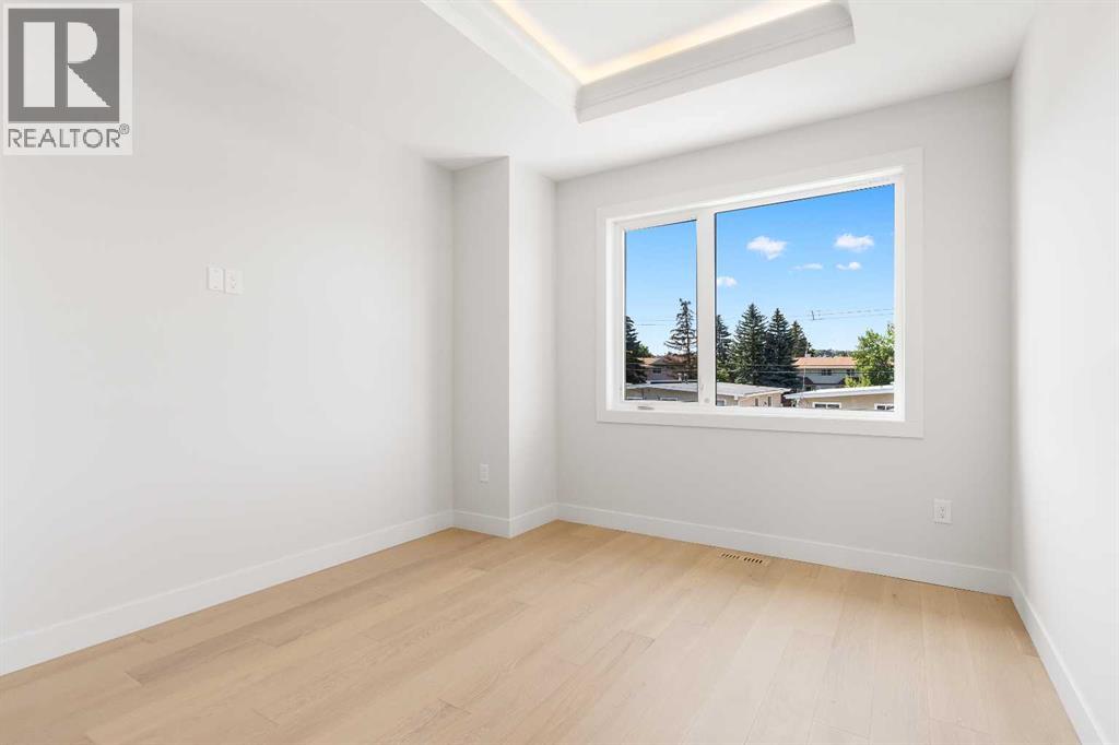 Single Family House for Sale in   Street SW Rosscarrock Calgary 