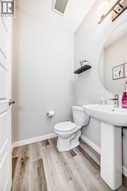 Single Family House for Sale in   Belmont Drive SW Belmont Calgary 