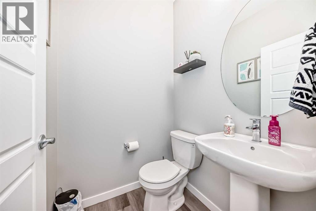 Single Family House for Sale in   Belmont Drive SW Belmont Calgary 