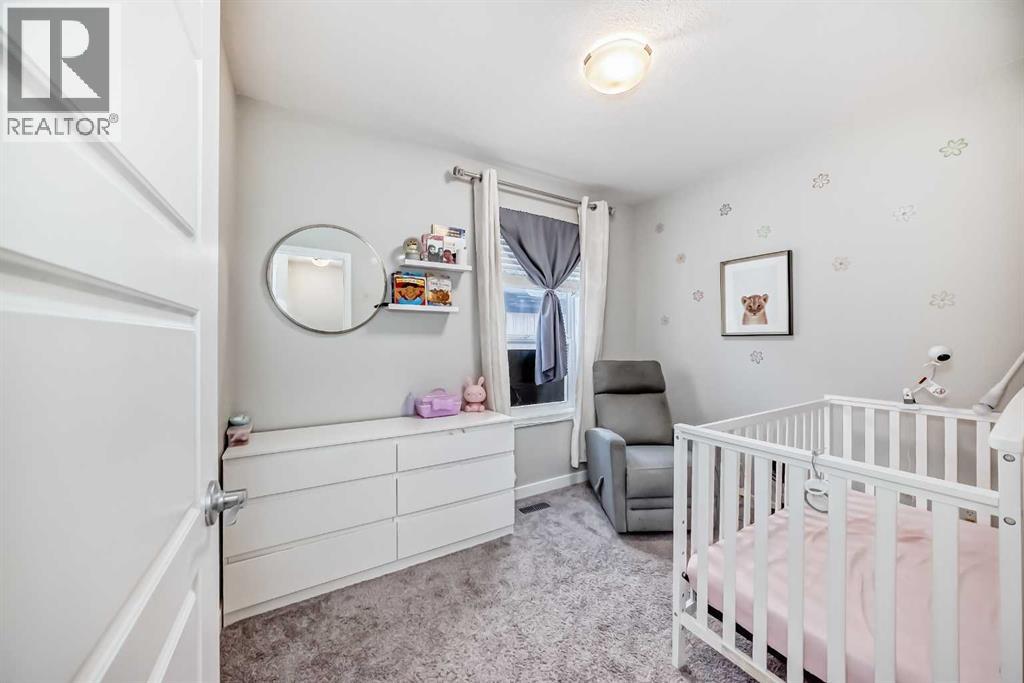 Single Family House for Sale in   Belmont Drive SW Belmont Calgary 