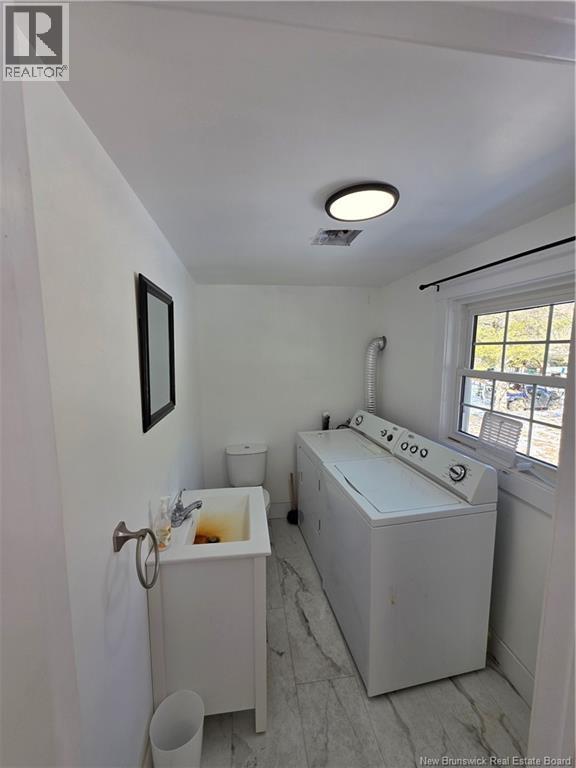 Downstairs 1/2 bath with Laundry