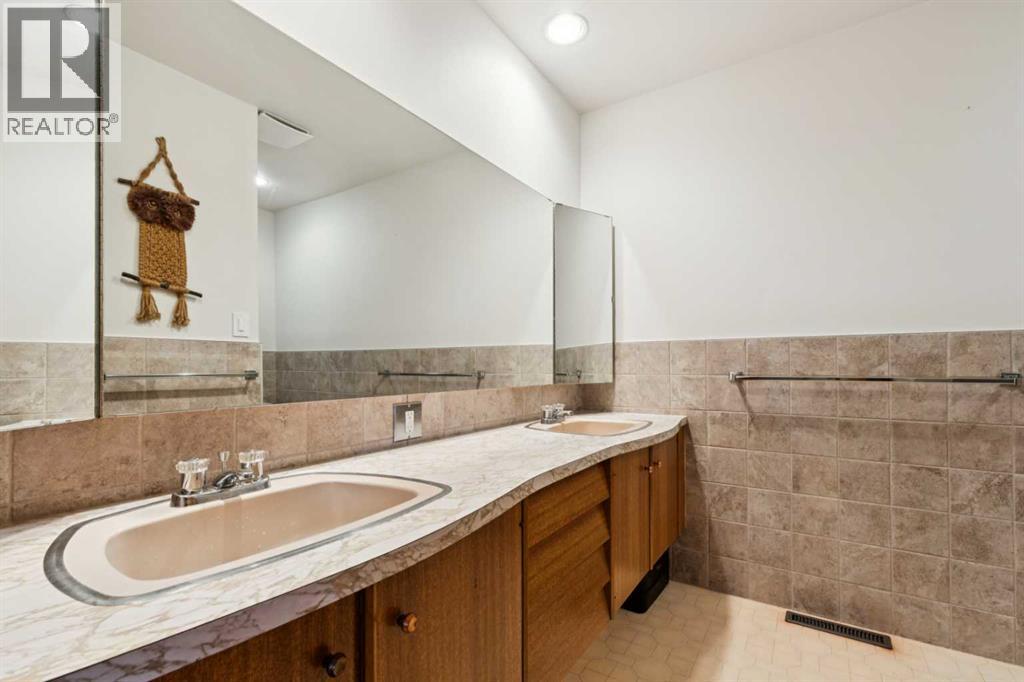 Single Family House for Sale in  Kananaskis Drive SW Kelvin Grove Calgary 