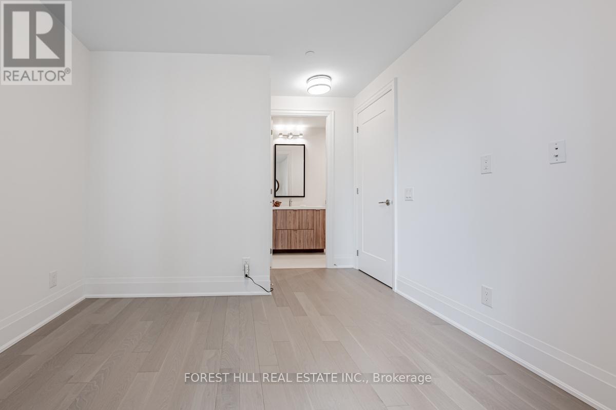 #201 280 HOWLAND AVENUE - 23