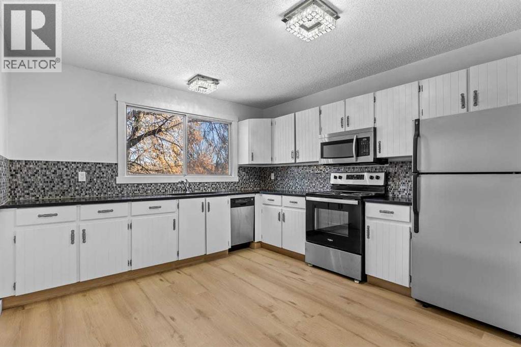 Single Family House for Sale in A Bowness Road NW Bowness Calgary 