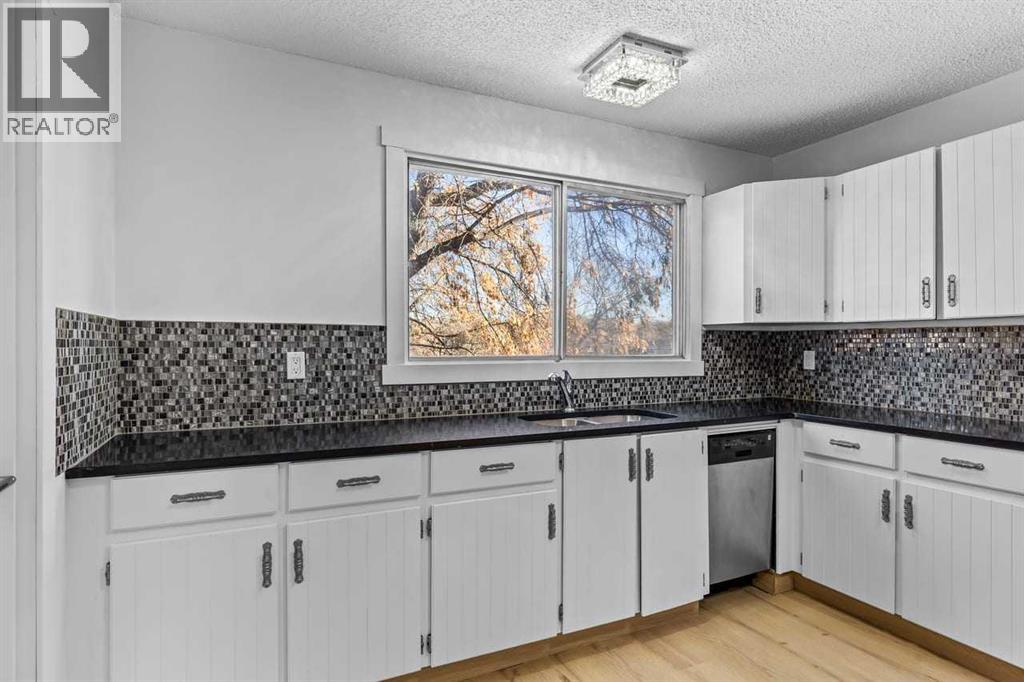 Single Family House for Sale in A Bowness Road NW Bowness Calgary 