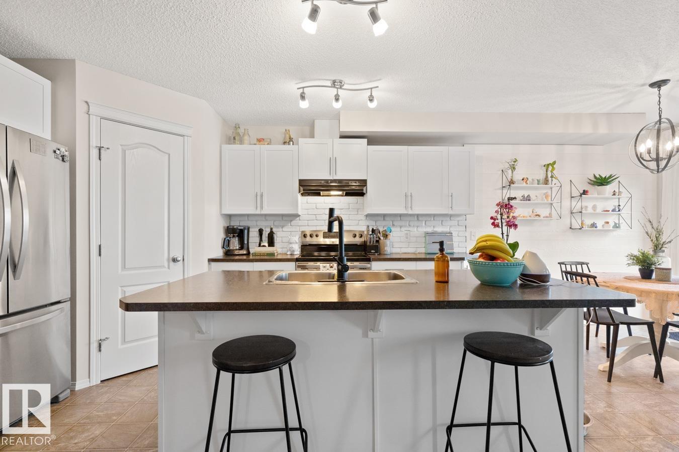 
          3124 16 AV NW
            <br/>
            <span>Edmonton</span>
            , 
            <span>AB</span>
             <span>T6T0T8</span>
         - Photo 33