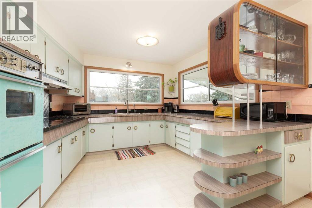 Single Family House Bungalow for Sale in   Street S Glendale Lethbridge 