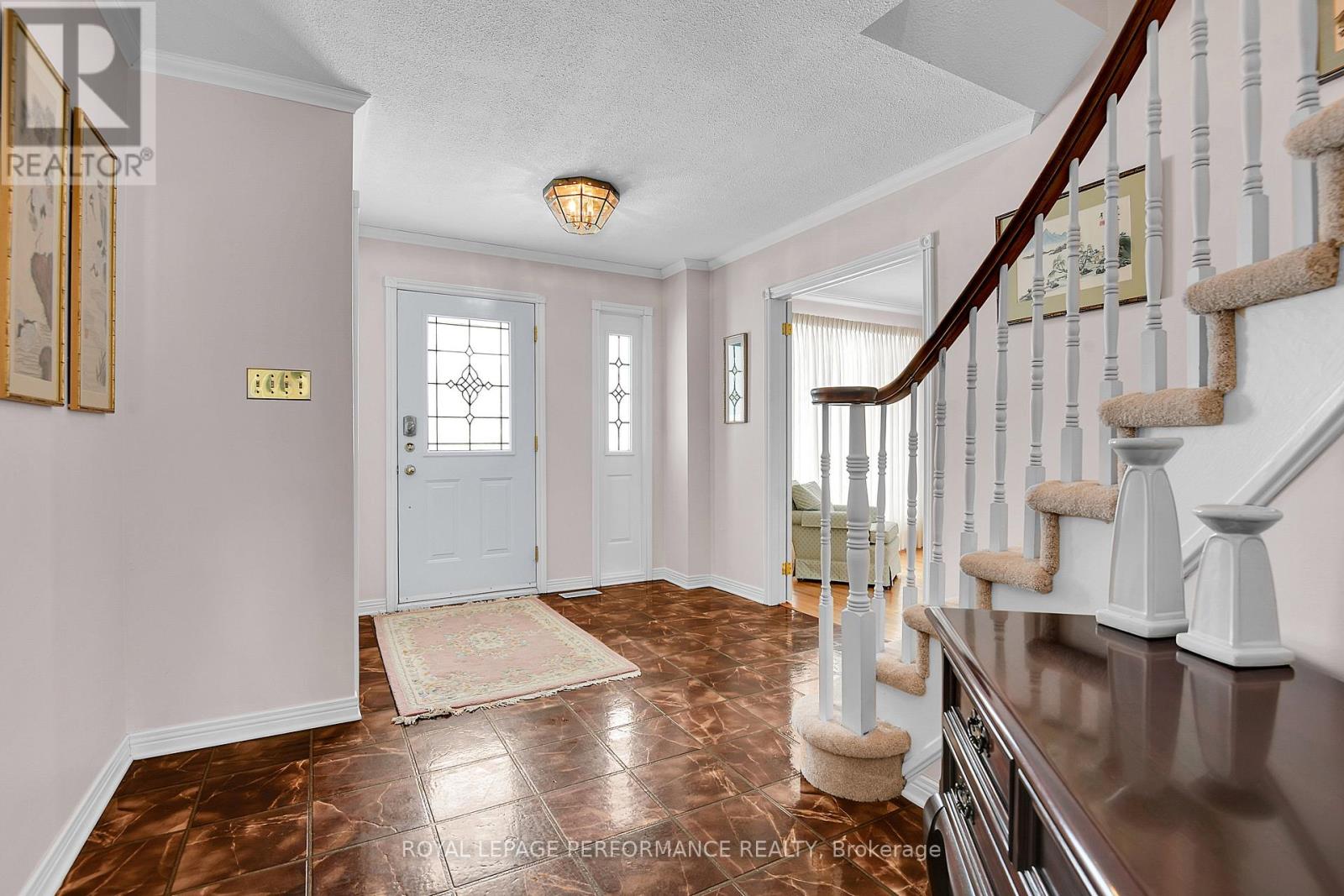 Spacious foyer in the classic centre hall plan