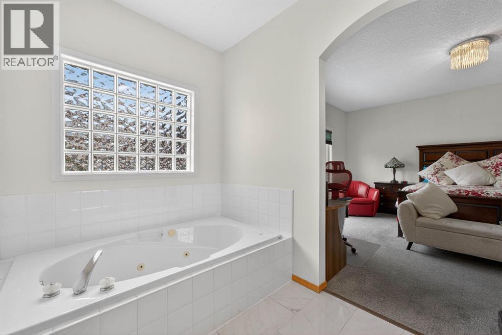 Single Family House Bungalow for Sale in  Sienna Ridge Landing SW Signal Hill Calgary 