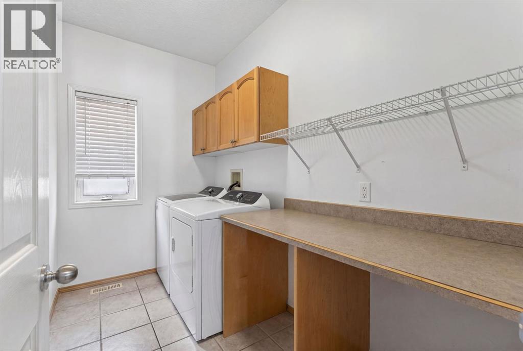 Single Family House Bungalow for Sale in  Sienna Ridge Landing SW Signal Hill Calgary 