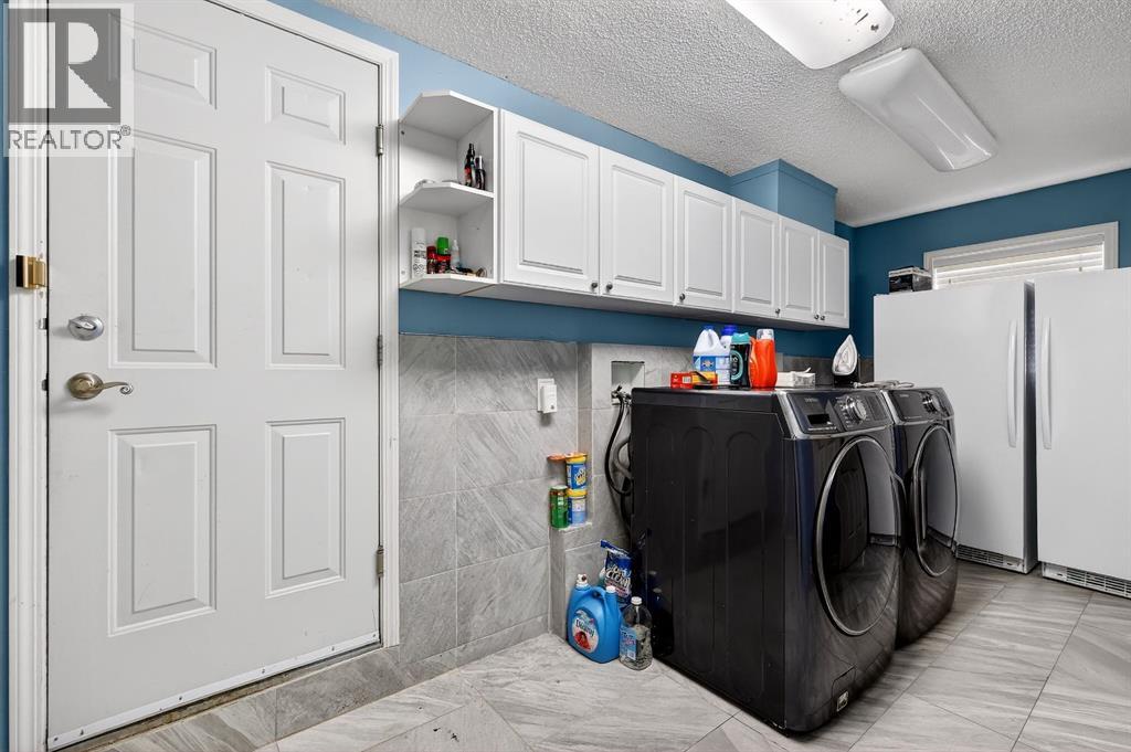 Single Family House Bi-level for Sale in  Mt Douglas Court SE McKenzie Lake Calgary 