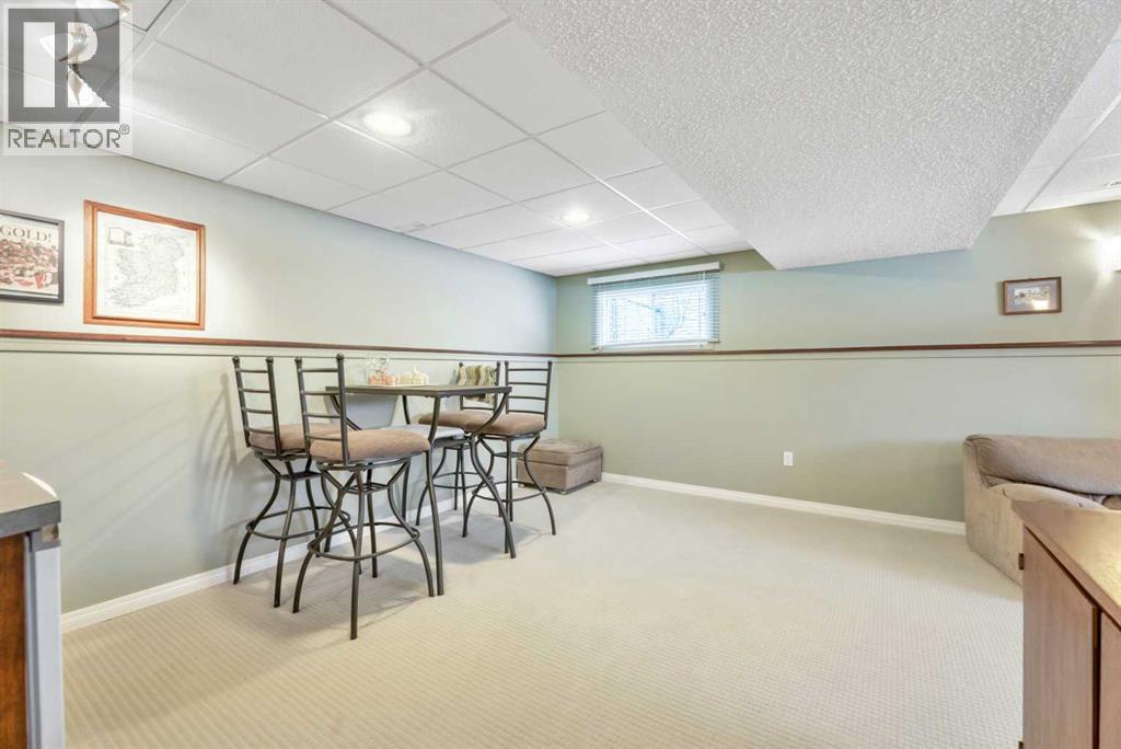 Single Family House Bi-level for Sale in  Lake Waterton Crescent SE Lake Bonavista Calgary 