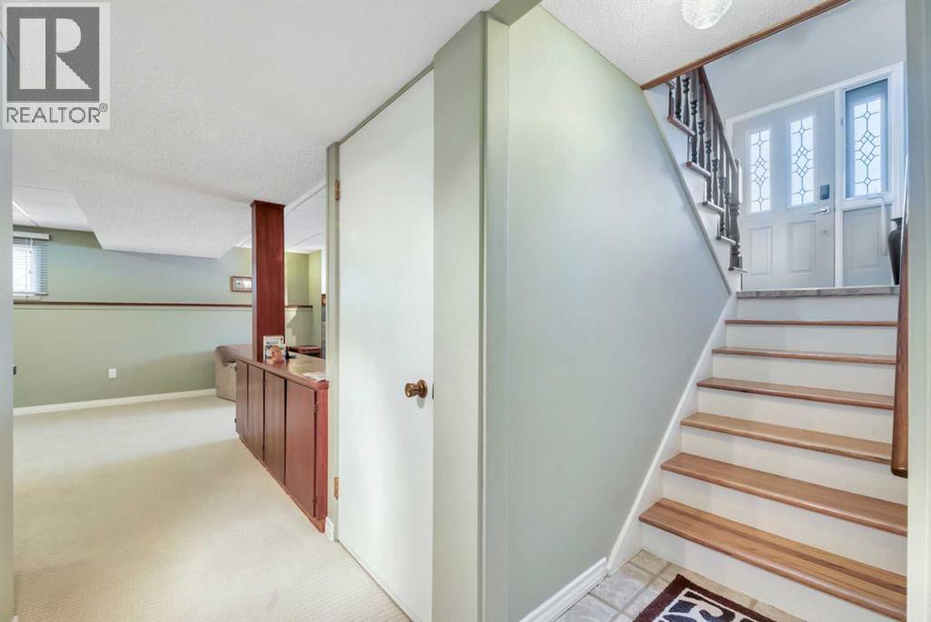 Single Family House Bi-level for Sale in  Lake Waterton Crescent SE Lake Bonavista Calgary 