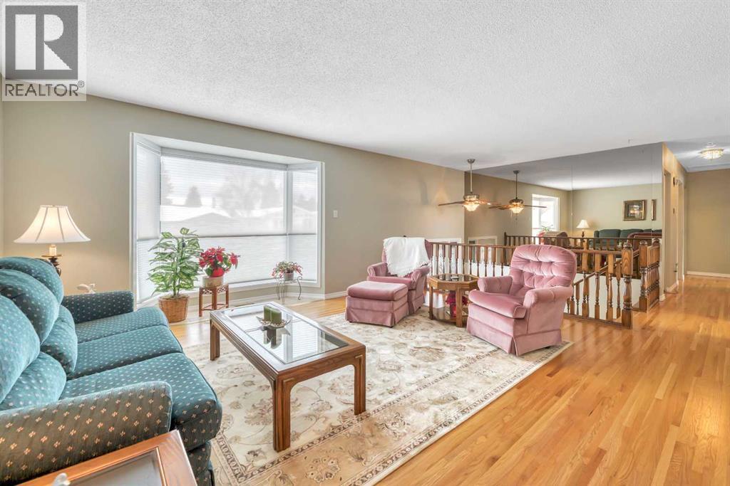 Single Family House Bi-level for Sale in  Lake Waterton Crescent SE Lake Bonavista Calgary 