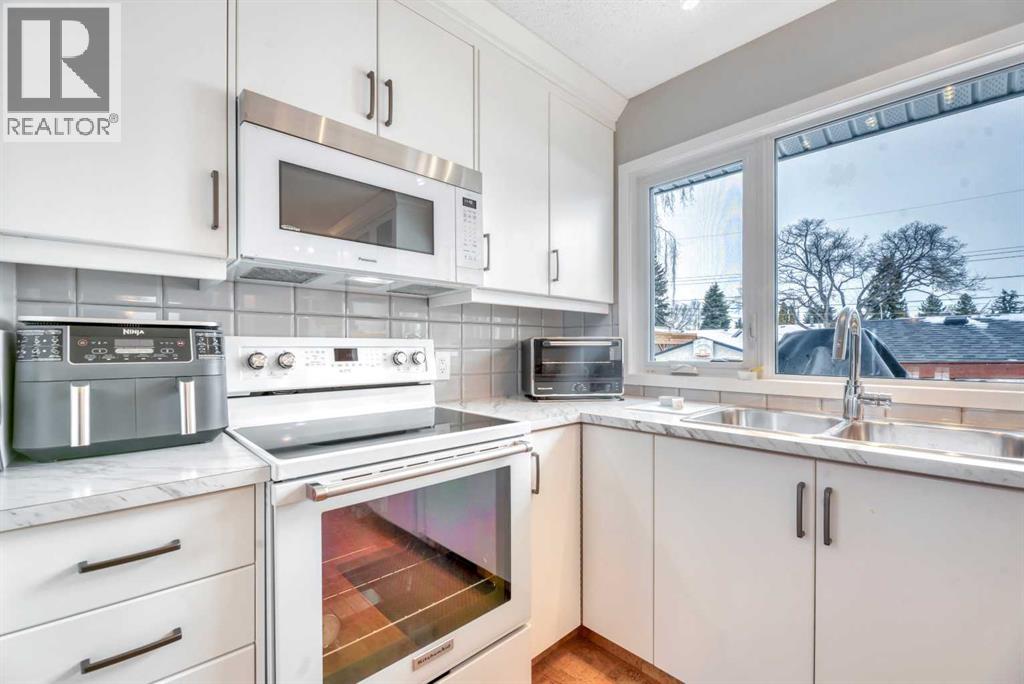 Single Family House Bi-level for Sale in  Lake Waterton Crescent SE Lake Bonavista Calgary 