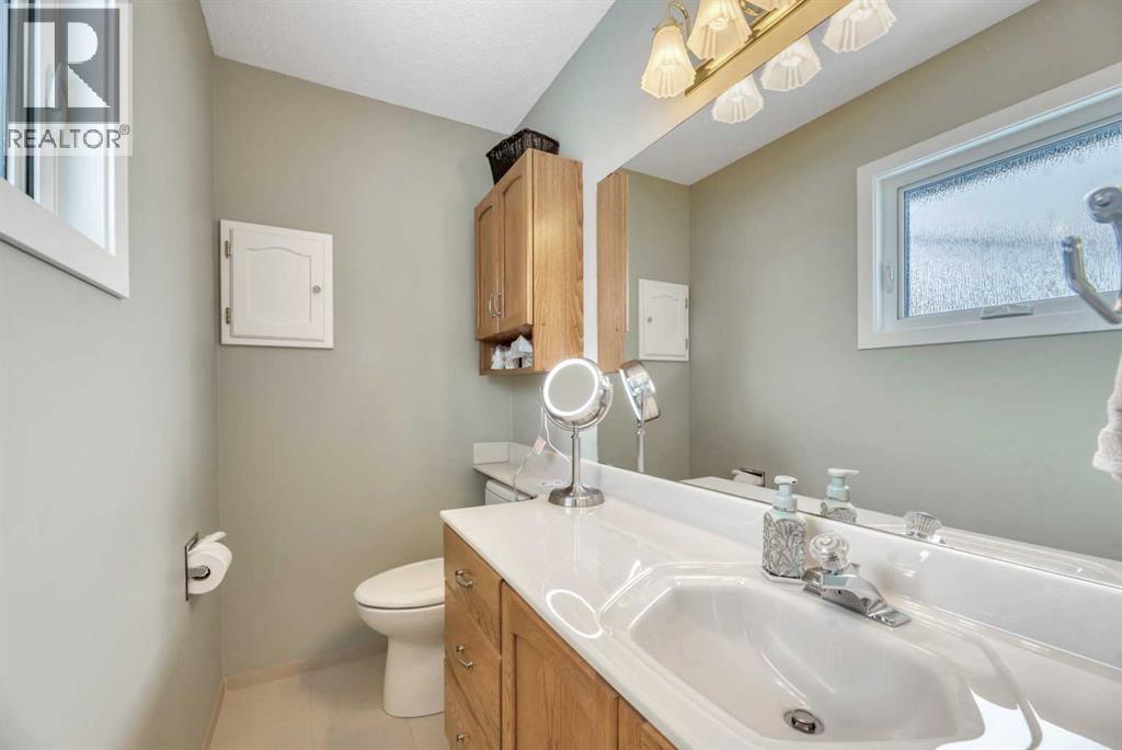 Single Family House Bi-level for Sale in  Lake Waterton Crescent SE Lake Bonavista Calgary 