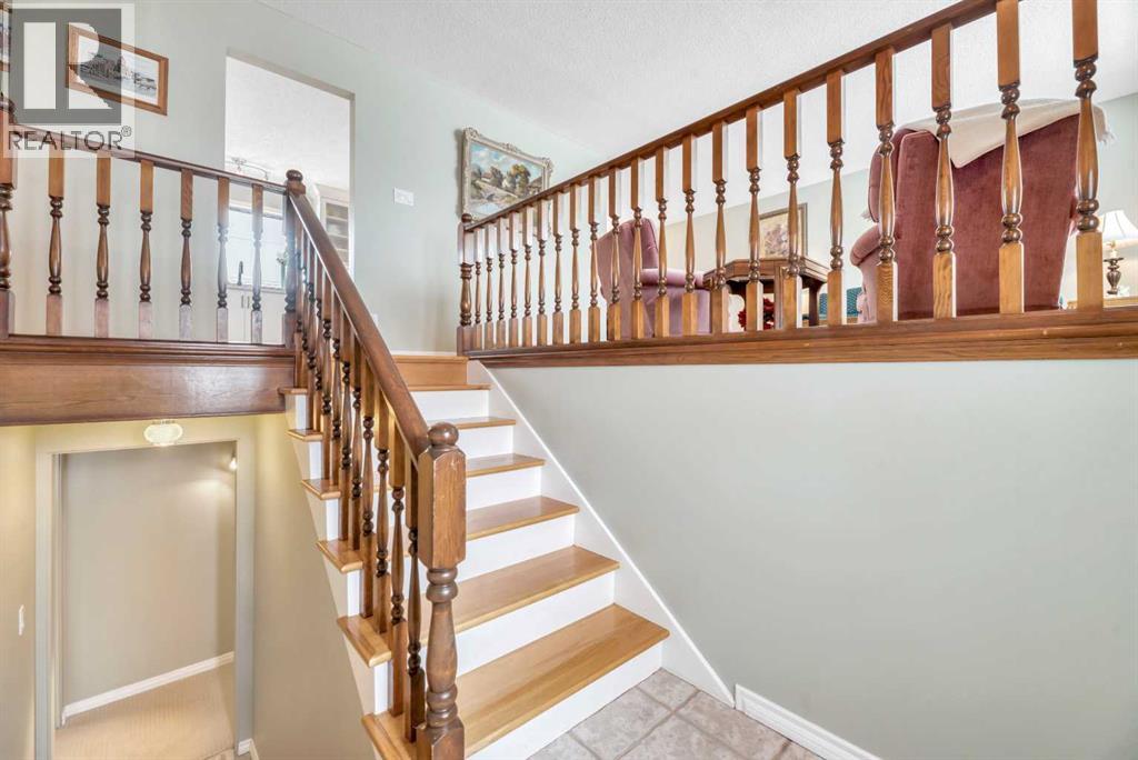 Single Family House Bi-level for Sale in  Lake Waterton Crescent SE Lake Bonavista Calgary 