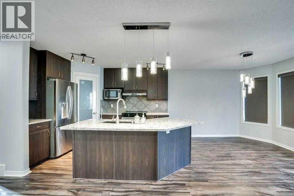Single Family House for Sale in  New Brighton Circle SE New Brighton Calgary 