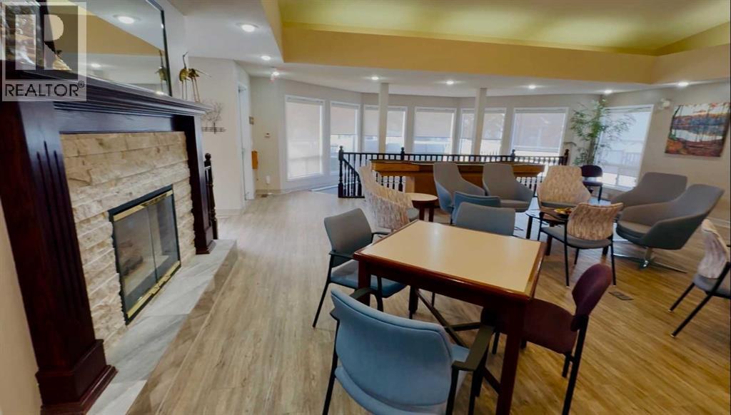 Single Family House for Sale in  Macewan Ridge Villas NW MacEwan Glen Calgary 