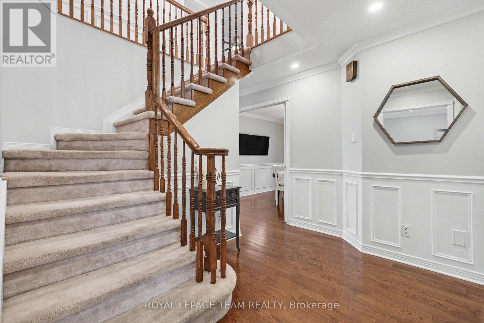 Grand staircase. Looking towards dining room.