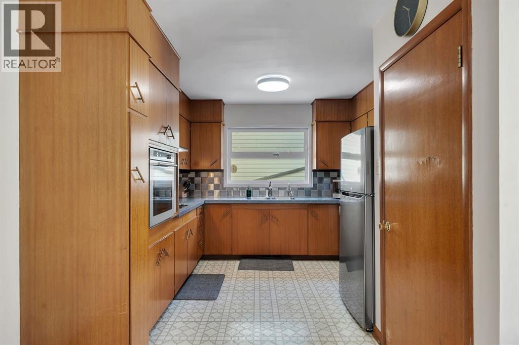 Single Family House Bungalow for Sale in  Kentish Drive SW Kingsland Calgary 