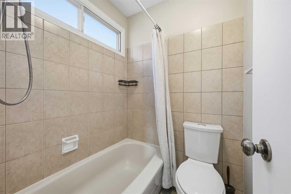 Single Family House Bungalow for Sale in  Lake Adams Place SE Lake Bonavista Calgary 