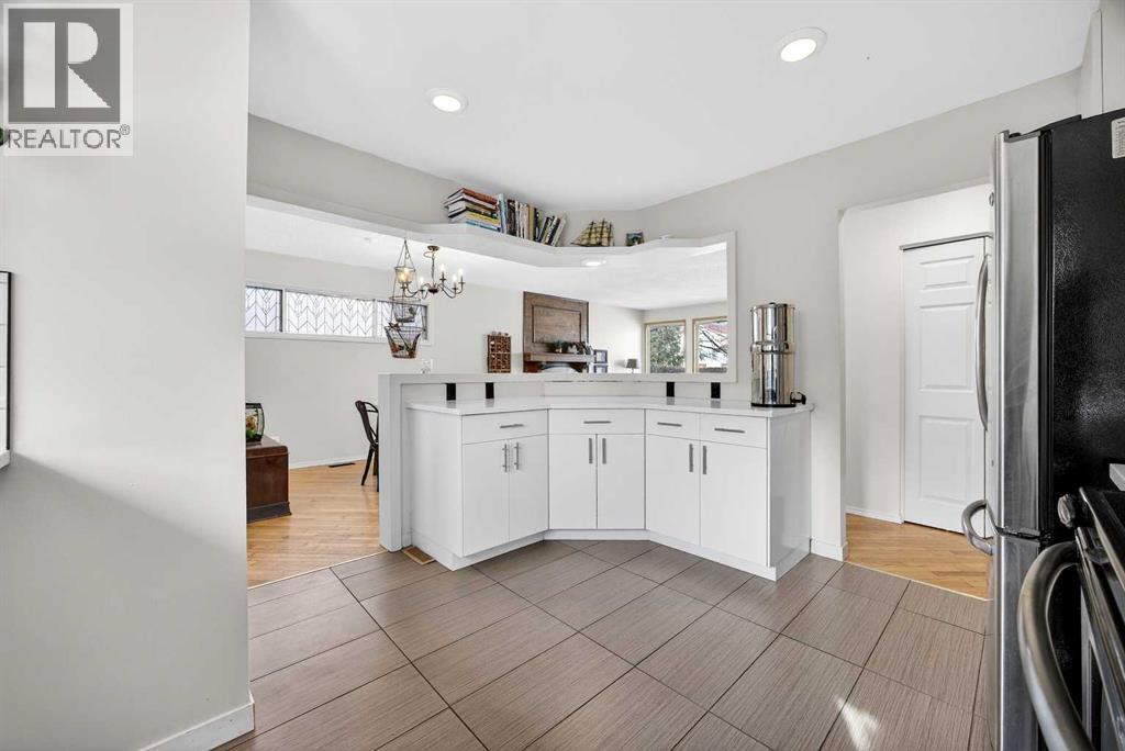 Single Family House Bungalow for Sale in  Strathcona Close SW Strathcona Park Calgary 