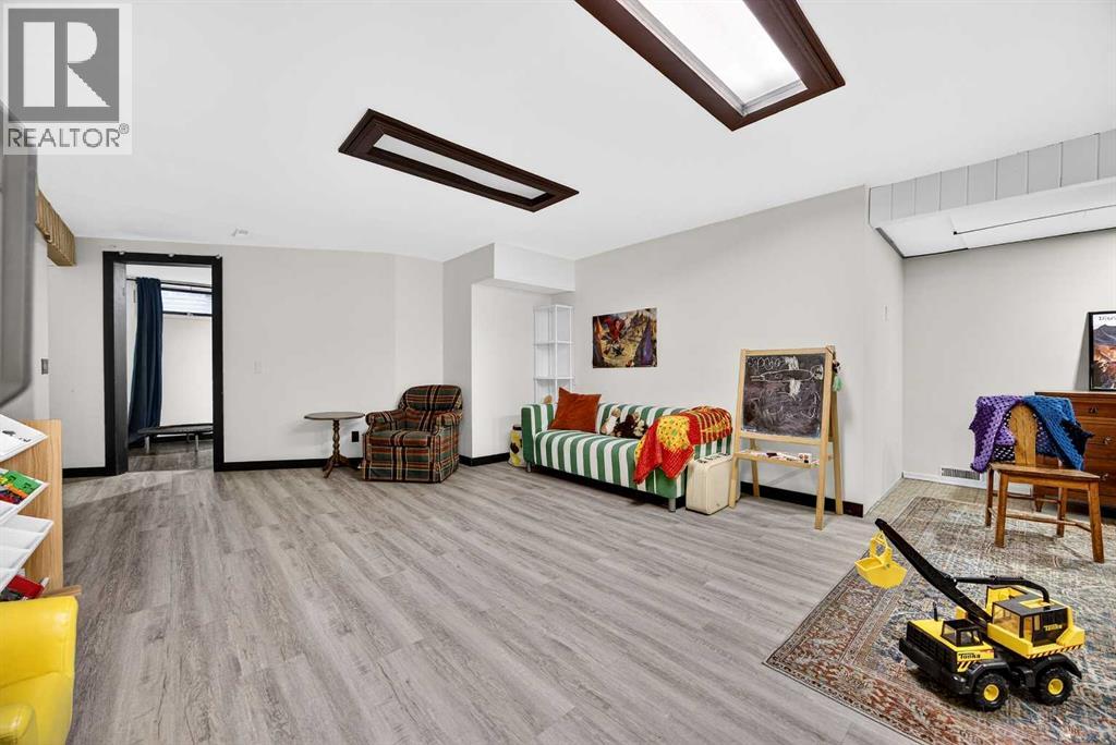 Single Family House Bungalow for Sale in  Strathcona Close SW Strathcona Park Calgary 