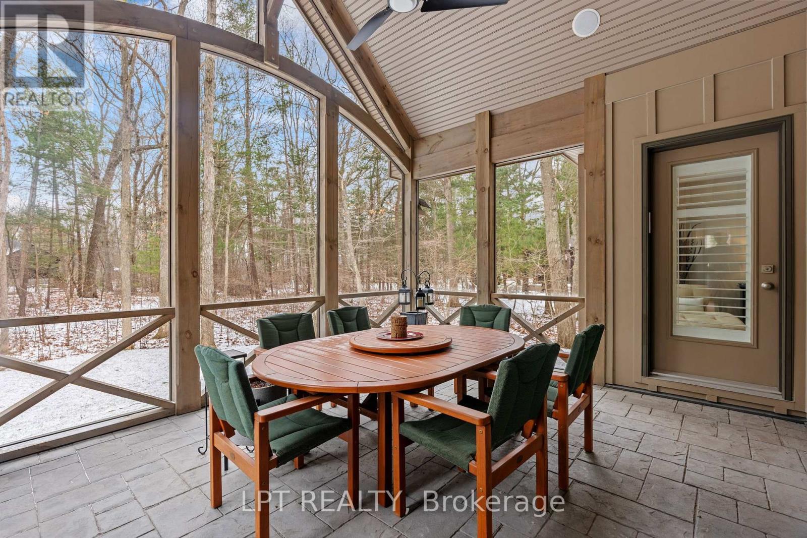 Screened in patio to enjoy the outdoors.