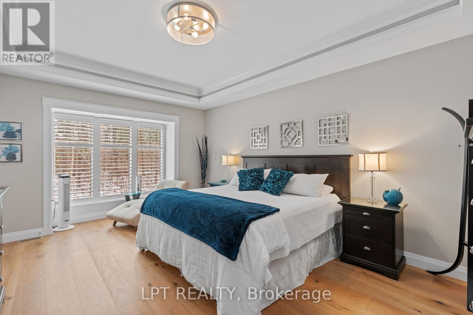 Master bedroom with door to the screened in Patio!