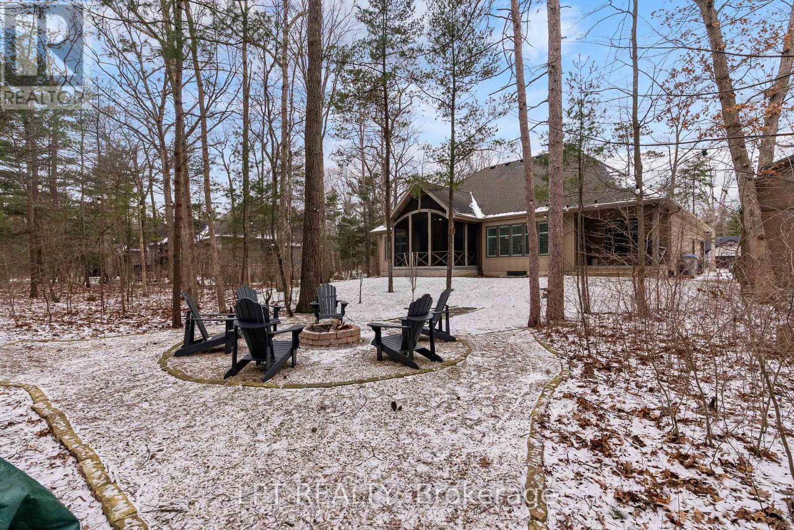 Fire pit is private on the edge of the woods.