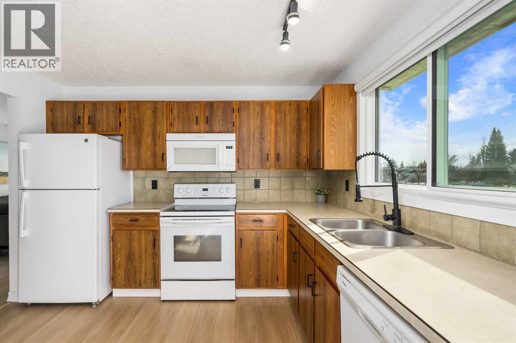 Single Family House Bungalow for Sale in  Millcrest Green SW Millrise Calgary 