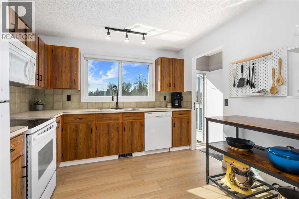 Single Family House Bungalow for Sale in  Millcrest Green SW Millrise Calgary 