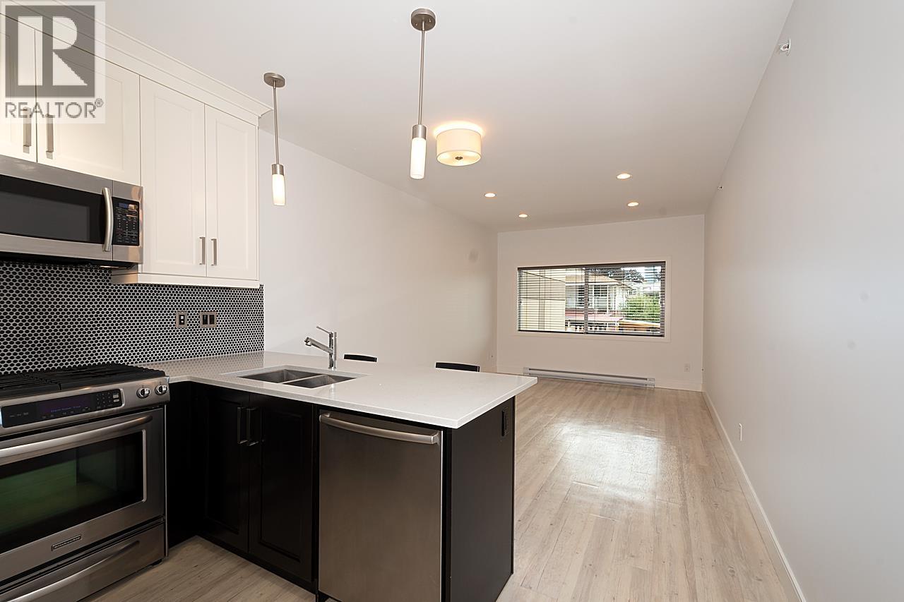 203 4548 HASTINGS Street - main photo