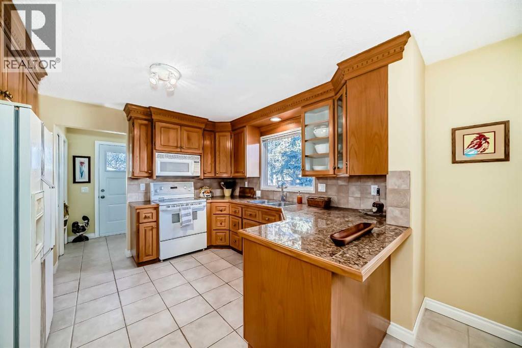 Single Family House for Sale in  Dalcastle Crescent NW Dalhousie Calgary 