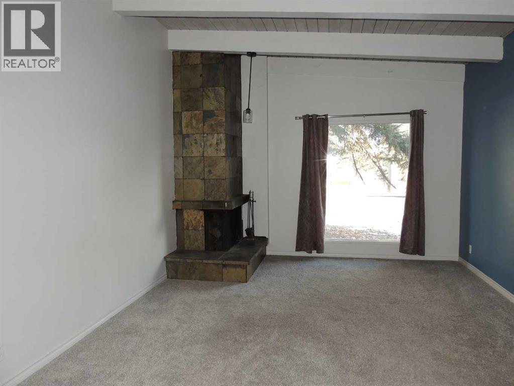 Single Family House Bi-level for Sale in  Canmore Road NW Banff Trail Calgary 