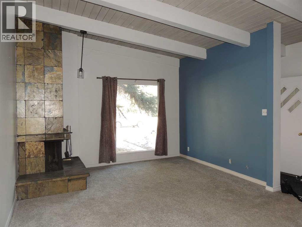 Single Family House Bi-level for Sale in  Canmore Road NW Banff Trail Calgary 
