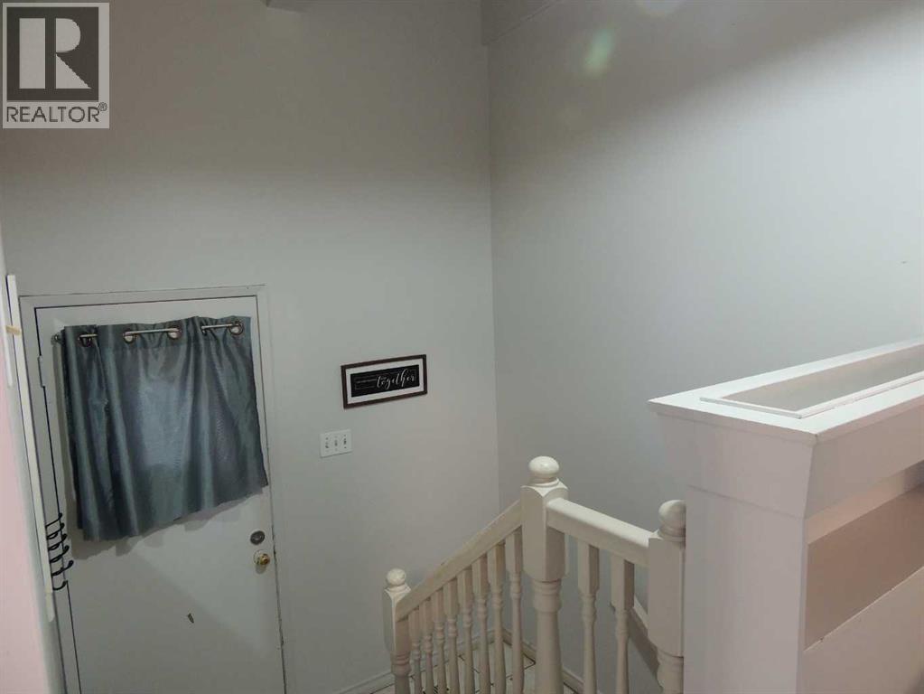 Single Family House Bi-level for Sale in  Canmore Road NW Banff Trail Calgary 